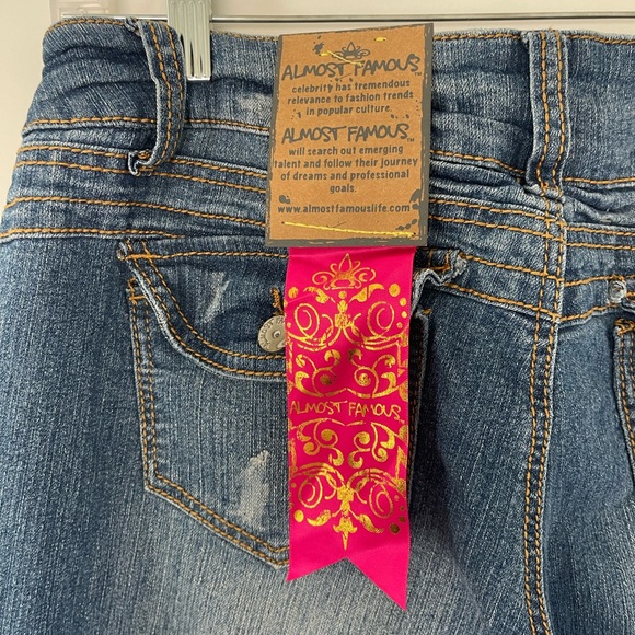 Y2K Blue distressed boot cut jeans with a medium wash and mid rise - Picture 5 of 7